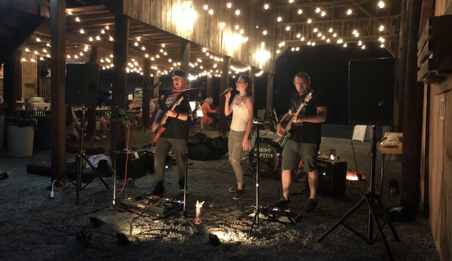 Band playing under the barn lights