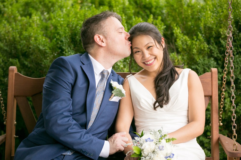 Weddings Wedding Look Book at Mountain Run Winery: Couple on porch swing