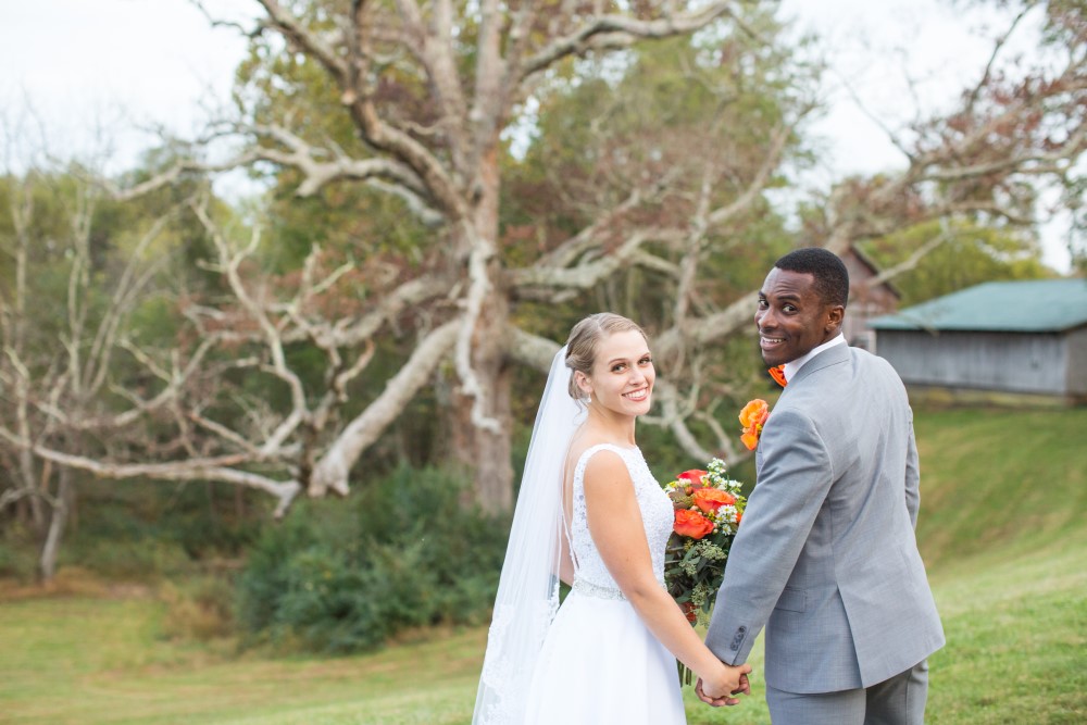 Wedding Look Book at Mountain Run Winery: Couple walking