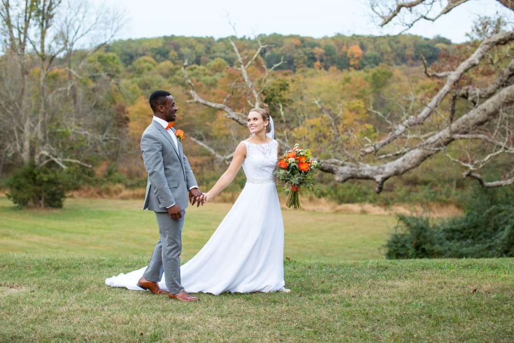 Wedding Look Book at Mountain Run Winery: Couple walking