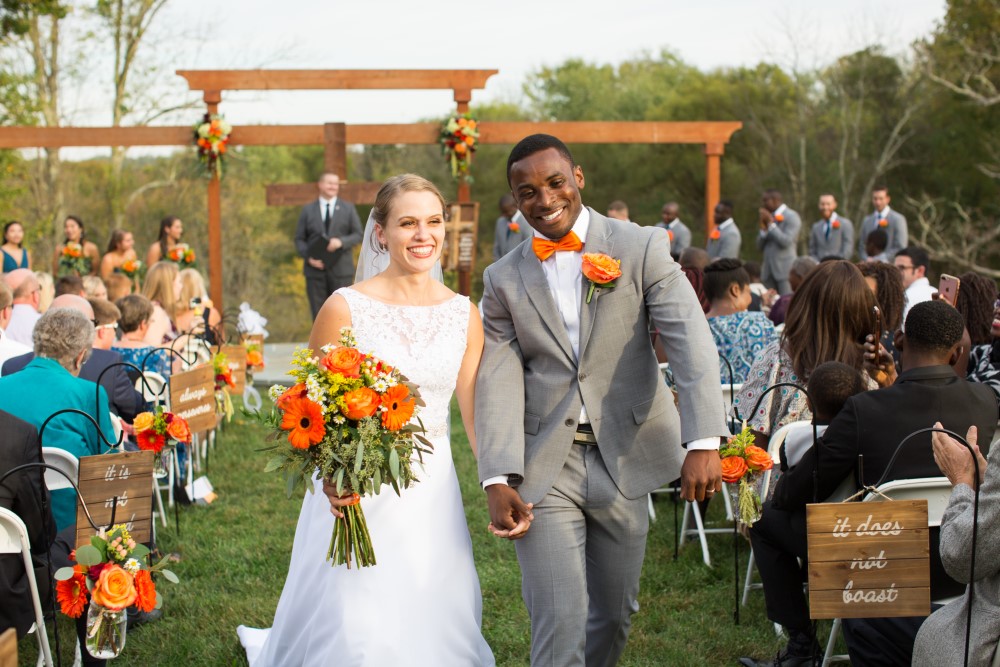 Wedding Look Book at Mountain Run Winery: couple exiting ceremony