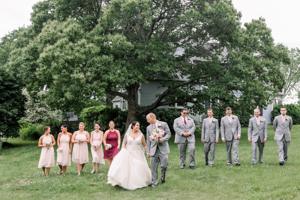 Wedding Look Book at Mountain Run Winery: Wedding party walking under tree