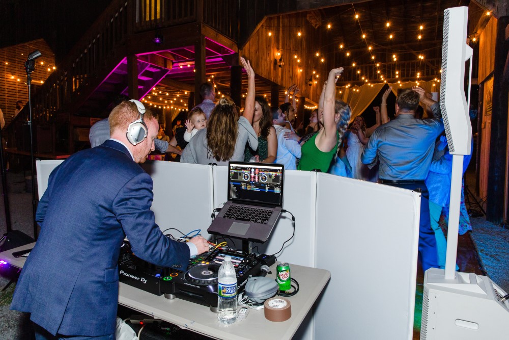 Wedding Look Book at Mountain Run Winery: DJ during dance party at winery