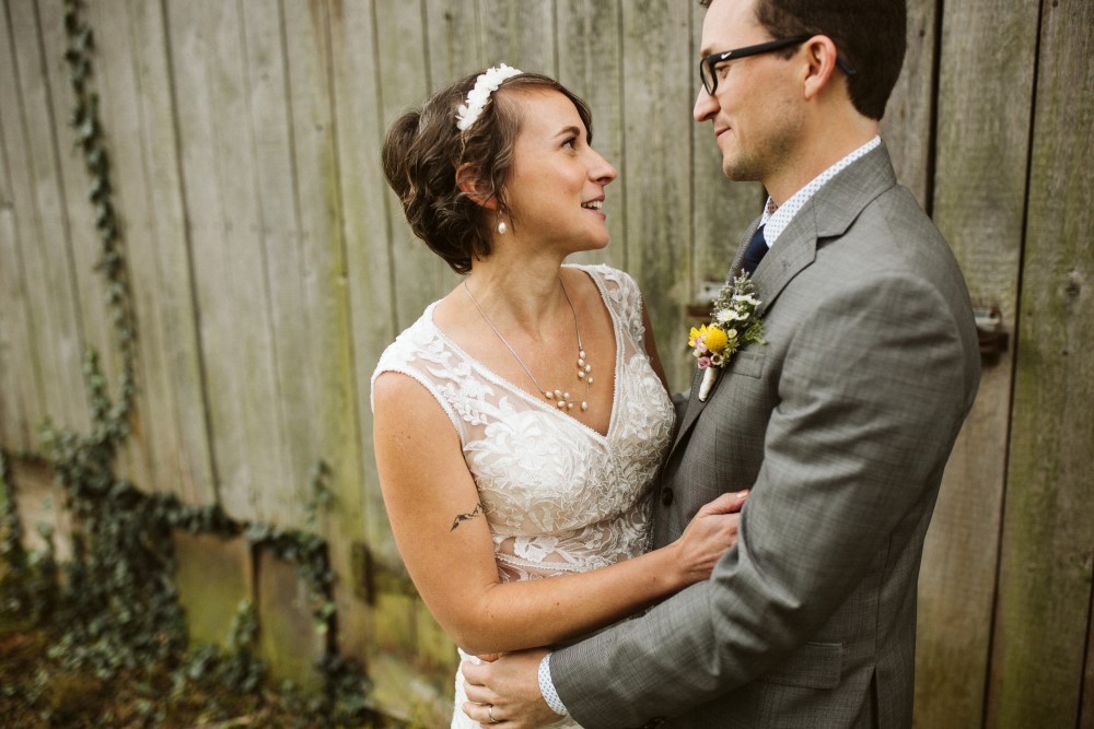 Wedding Look Book at Mountain Run Winery: Couple standing in front of barn