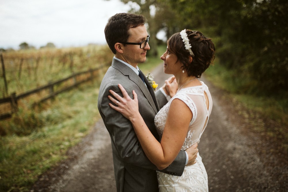 Weddings Wedding Look Book at Mountain Run Winery: Couple dancing on gravel drive