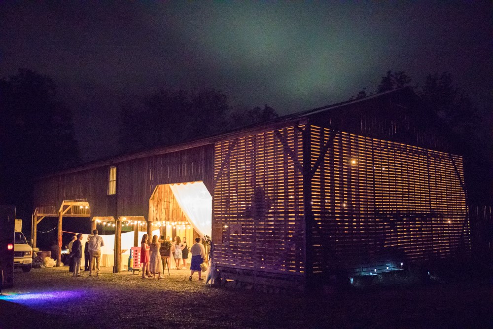 Wedding Look Book at Mountain Run Winery: Bride and military groom kissing