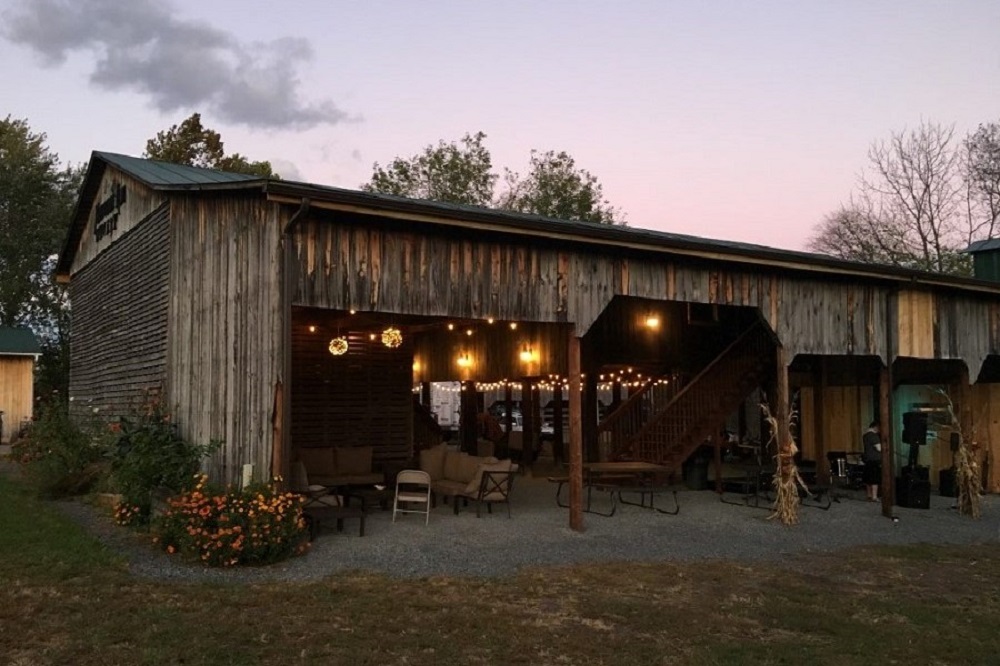 Wedding Look Book at Mountain Run Winery: Couple dancing on gravel drive