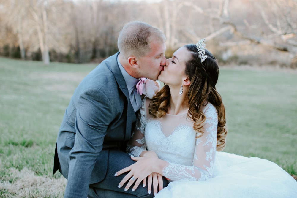 Wedding Look Book at Mountain Run Winery: Bride and groom kissing