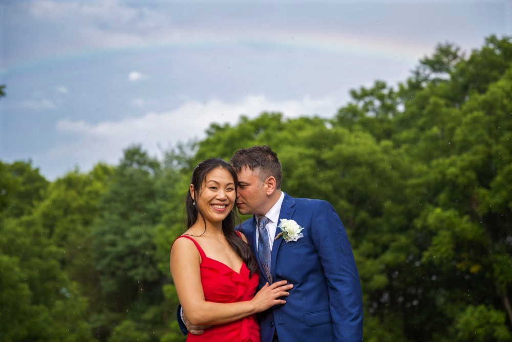 Wedding Look Book at Mountain Run Winery: Couple standing under rainbow