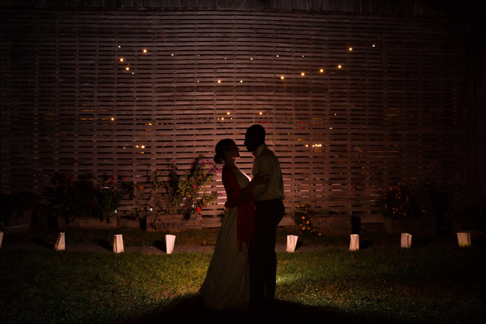 Wedding Look Book at Mountain Run Winery: Couple silhouette with barn lights 