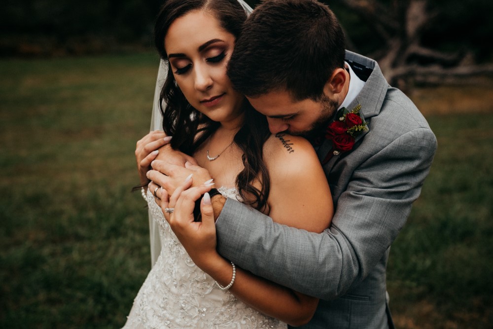 Wedding Look Book at Mountain Run Winery: Couple embracing
